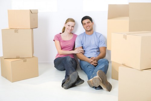 Local Kensington moving team handling bulky items with care