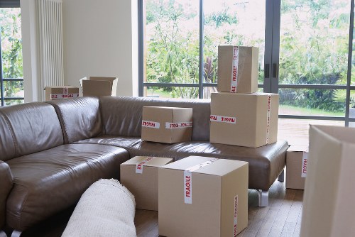 Packed boxes and furniture prepared for a local move in Kensington
