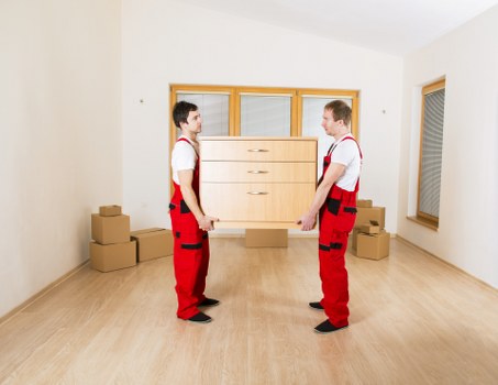 Packed boxes and furniture prepared for temporary storage in Kensington