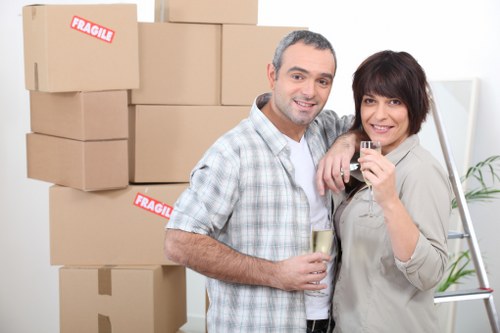 Careful wrapping of fragile items for a Kensington move